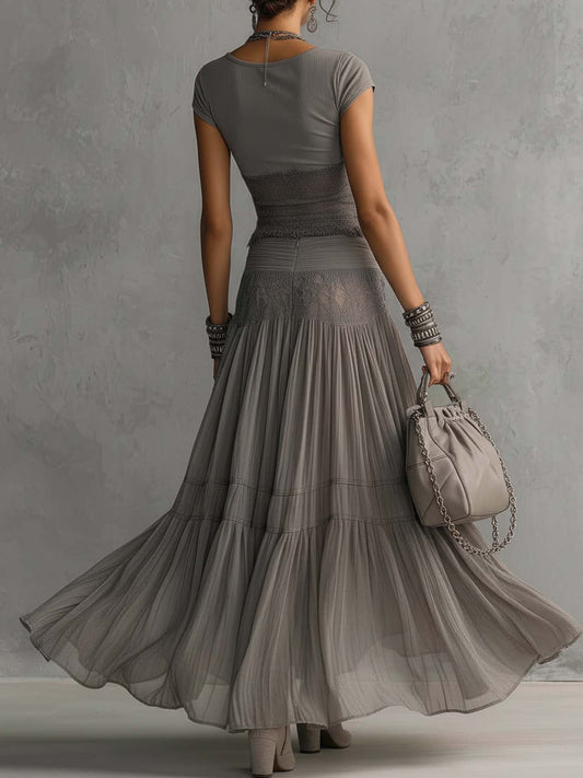 Carmen-Conjunto de blusa gris con paneles de encaje y falda larga plisada